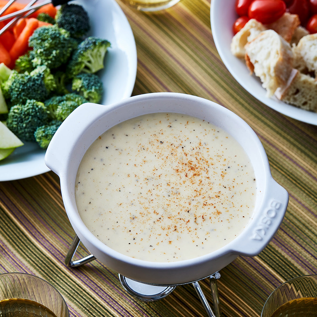 Classic Alpine Fondue with Wine, Garlic, and Three Kinds of Cheese