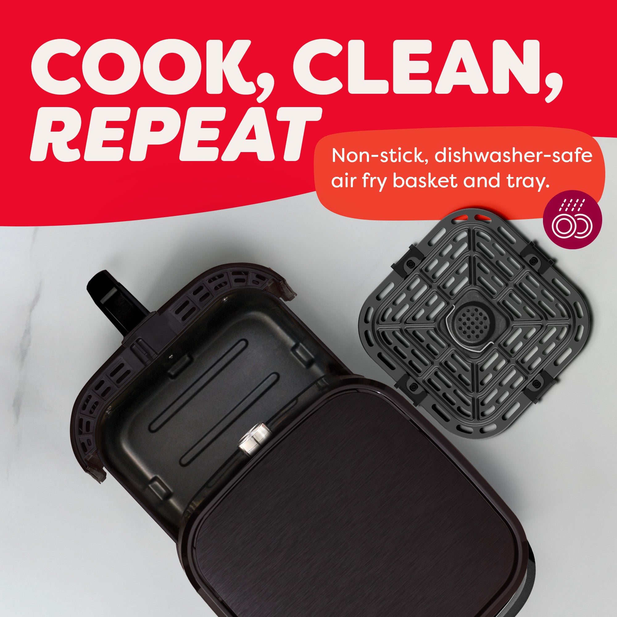 Open air fryer with removable non-stick tray beside it on a countertop. Text reads: 'Cook, Clean, Repeat — Non-stick, dishwasher-safe air fry basket and tray.'