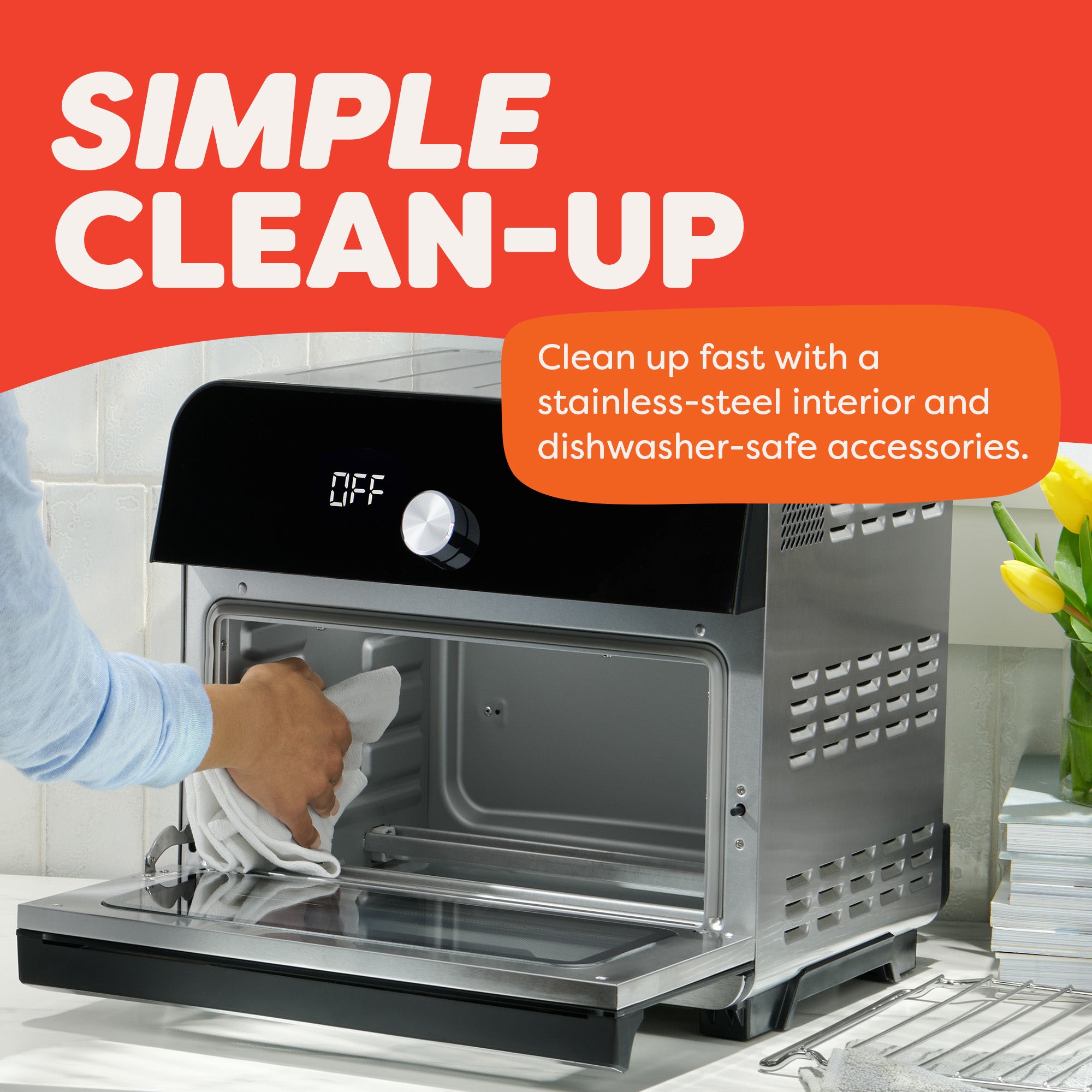 Person cleaning air fryer oven. Text: 'Simple clean-up with stainless-steel interior and dishwasher-safe accessories.'