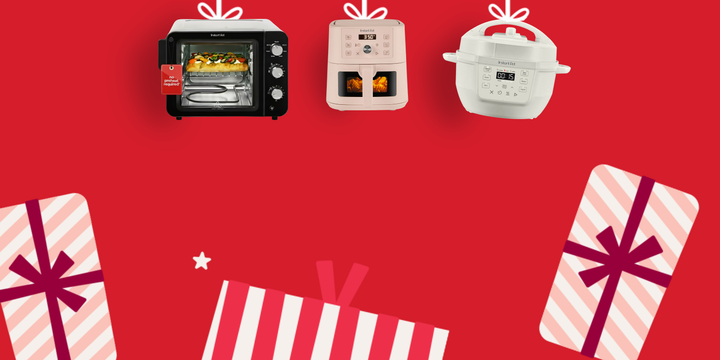 Small kitchen appliances on a red background with gift boxes.