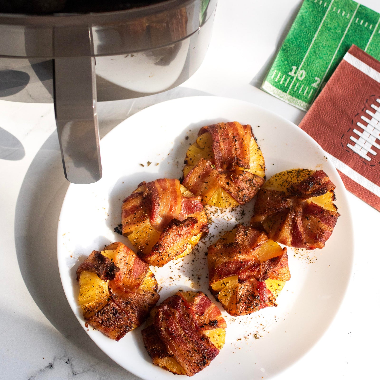 Instant Vortex Air Fryer -Bacon Wrapped Cajun Pineapple Rings