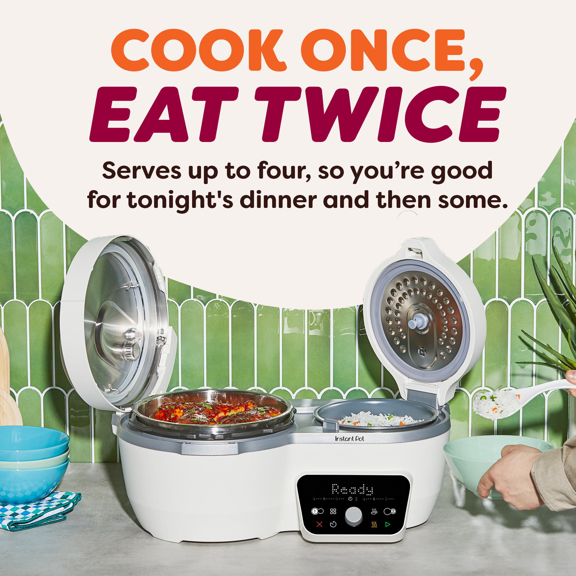 Sea Salt Dual Action Multi-Cooker with both lids open, revealing a larger main pot with glazed chicken and a smaller side pot with vegetable rice. Info shows that product serves up to four people.