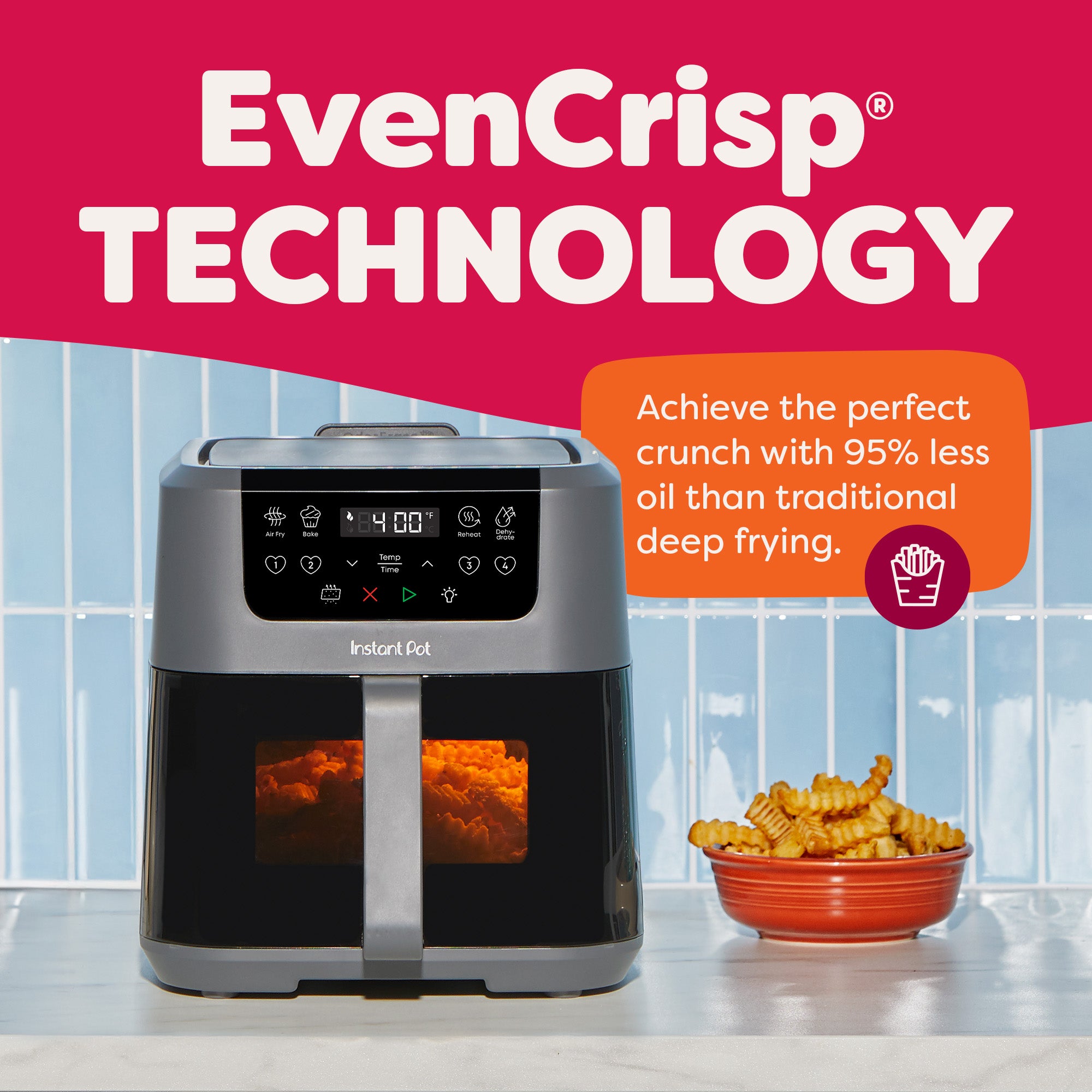 The air fryer on a counter next to a bowl of crinkle-cut fries. Text highlights “EvenCrisp® Technology” and notes 95% less oil than deep frying.