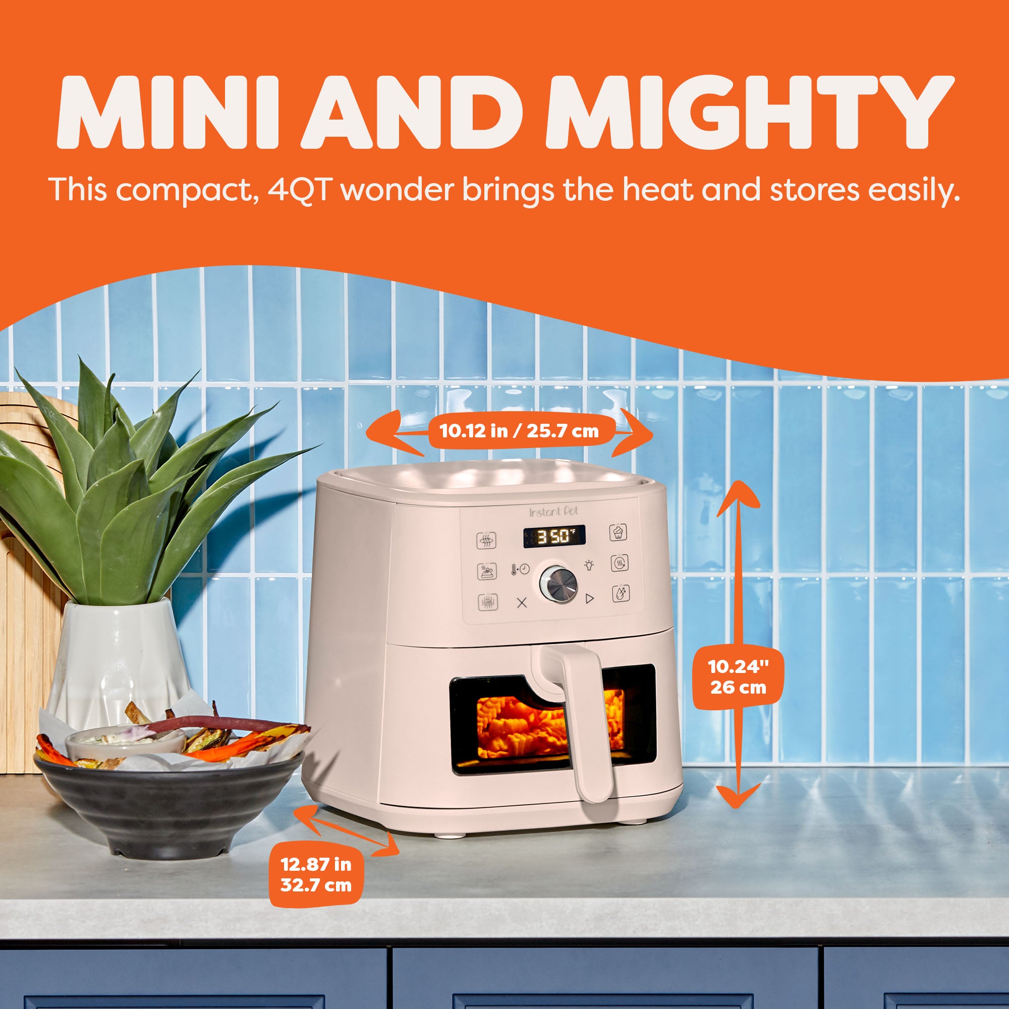 Alt text: Instant Pot® 4QT Vortex® Plus Mini Air Fryer in Rosewater on a kitchen counter, with dimensions labeled: 10.12 inches wide, 10.24 inches tall, and 12.87 inches deep. The appliance displays 350°F and has fries cooking inside, next to a bowl of sweet potato fries and a potted plant, with the headline “Mini and Mighty.”