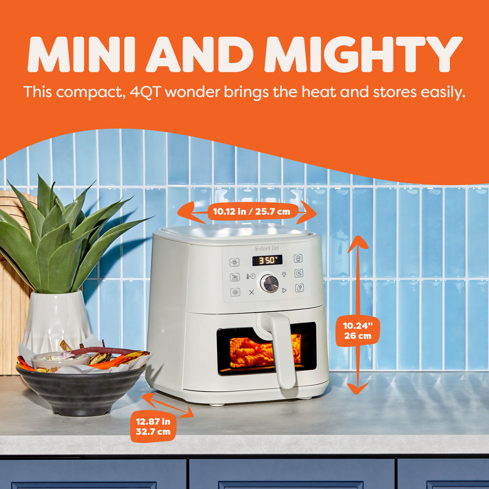 Instant Pot® 4QT Vortex® Plus Mini Air Fryer in Sea Salt on a kitchen counter, with dimensions labeled: 10.12 inches wide, 10.24 inches tall, and 12.87 inches deep. The appliance displays 350°F and has fries cooking inside, next to a bowl of sweet potato fries and a potted plant, with the headline “Mini and Mighty.”