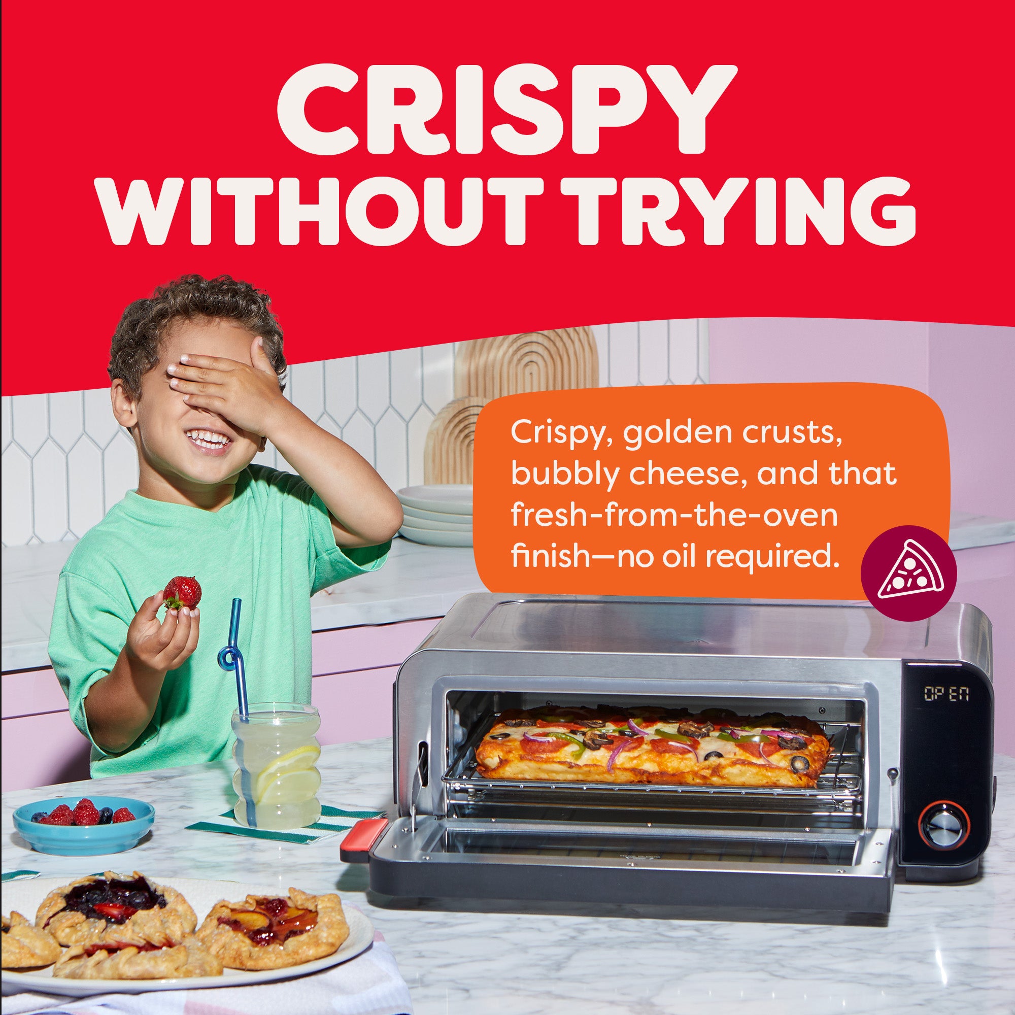 A smiling child eats berries while the Instant Pot® InstantHeat™ Pizza and Toaster Oven bakes a pizza with the door open. Text reads “Crispy Without Trying,” and highlights golden crusts, bubbly cheese, and oil-free, fresh-from-the-oven results.