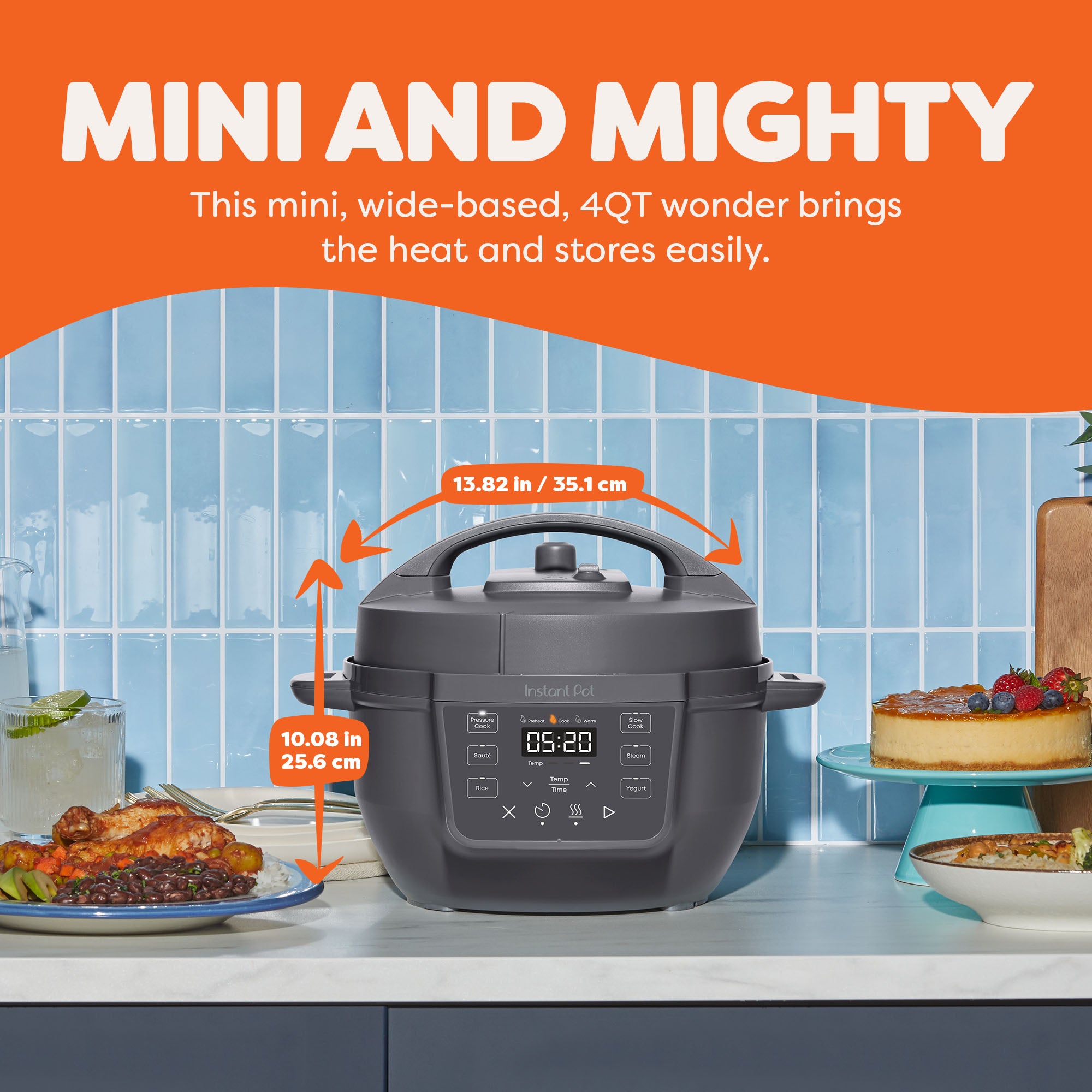  Instant Pot® 4QT RIO™ Mini Multi-Cooker in Truffle displayed on a kitchen counter with dimensions labeled—13.82 inches (35.1 cm) wide and 10.08 inches (25.6 cm) tall. The appliance sits between plated dishes and desserts, highlighting its compact, wide-based design ideal for tight spaces. The text above reads “Mini and Mighty: This mini, wide-based, 4QT wonder brings the heat and stores easily.”