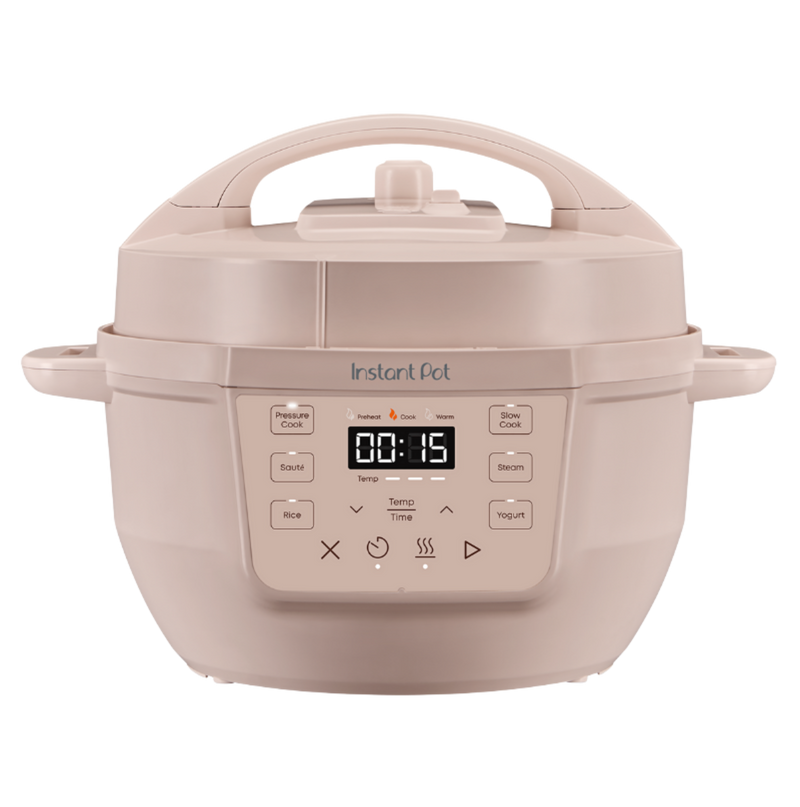 Instant Pot® 4QT RIO™ Mini Multi-Cooker in Rosewater with a matte finish, compact body, and an easy-to-read digital control panel featuring one-touch buttons for Pressure Cook, Sauté, Rice, Steam, Slow Cook, Yogurt, and Keep Warm functions. Timer is set to 00:15.