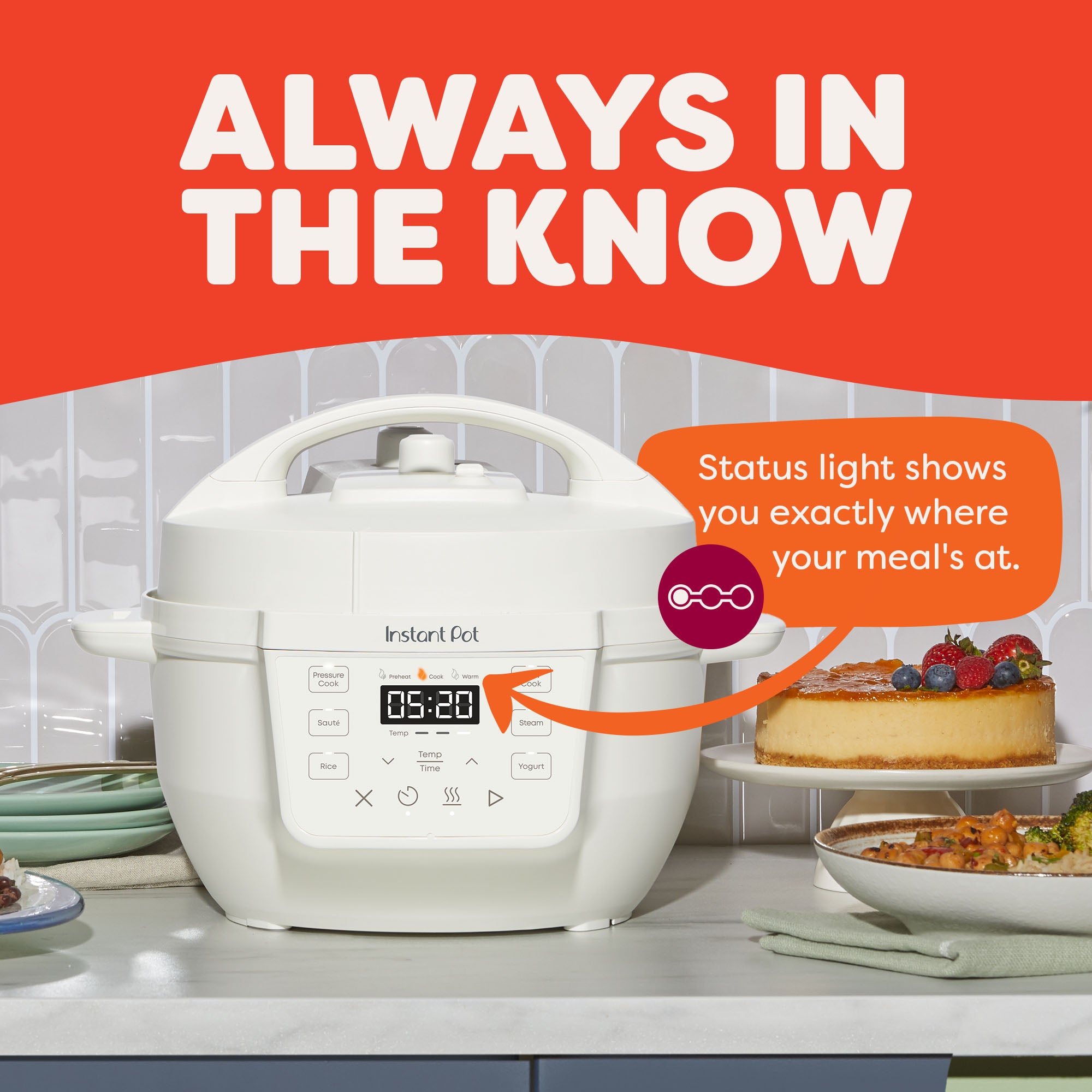 Instant Pot® 4QT RIO™ Mini Multi-Cooker in Sea Salt on a kitchen counter with the control panel lit up and the “Cook” status light highlighted. An orange callout reads, “Status light shows you exactly where your meal's at.” The background includes plated vegetables and a cheesecake, reinforcing the everyday kitchen setting. Header text above reads, “Always in the Know.”