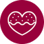 White capacity icon featuring a heart-shaped frozen treat with dotted toppings inside a circular burgundy background.